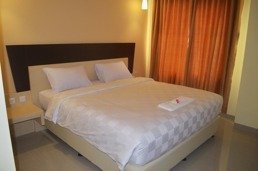 M Hotel Mataram Pokoj fotografie