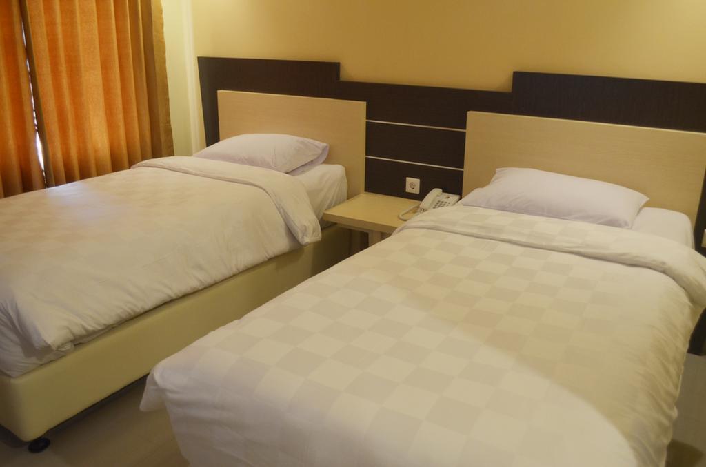 M Hotel Mataram Pokoj fotografie